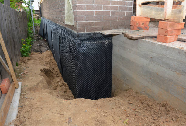SJ Waterproofing Pros technician performing targeted Vapor Barrier Installation assessment in North Bend, OR